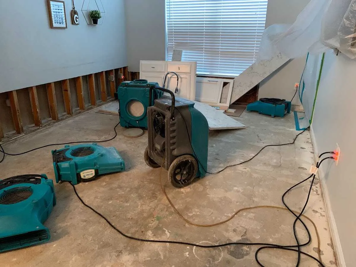 Dehumidifier in flood-cut room for Water Damage Restoration in Smithville